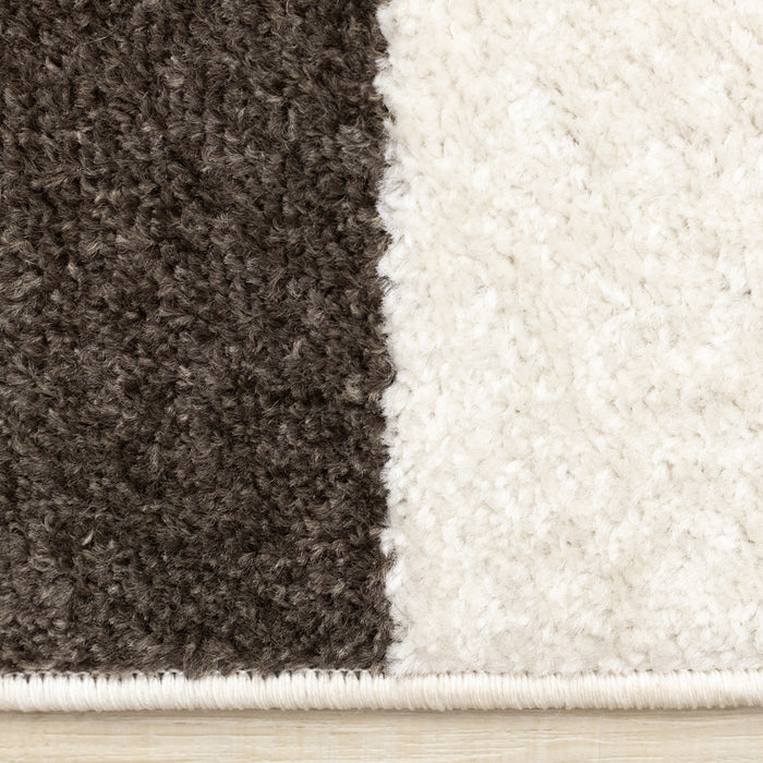 Carpette Marley taupe et rouge sang-de-bœuf à motif de courbes géométriques - 7 pi 10 po x 10 pi 6 po