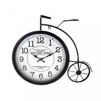 Horloge en métal noir en forme de bicyclette