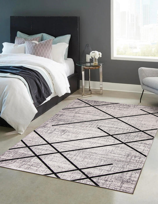 Carpette Damali ivoire et noire lavable à la machine - 5 pi 0 po x 7 pi 0 po
