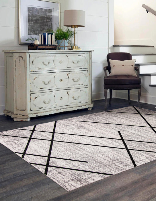 Carpette Damali ivoire et noire lavable à la machine - 6 pi 0 po x 9 pi 0 po