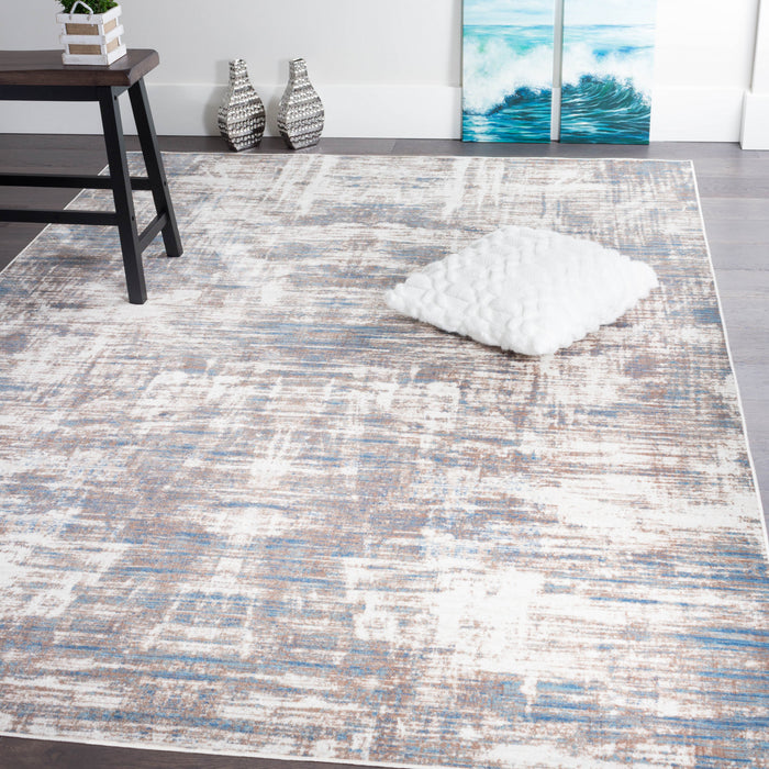 Carpette Shi bleue à motifs abstraits 5 x 8