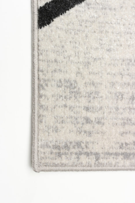 Carpette Damali ivoire et noire lavable à la machine - 5 pi 0 po x 7 pi 0 po