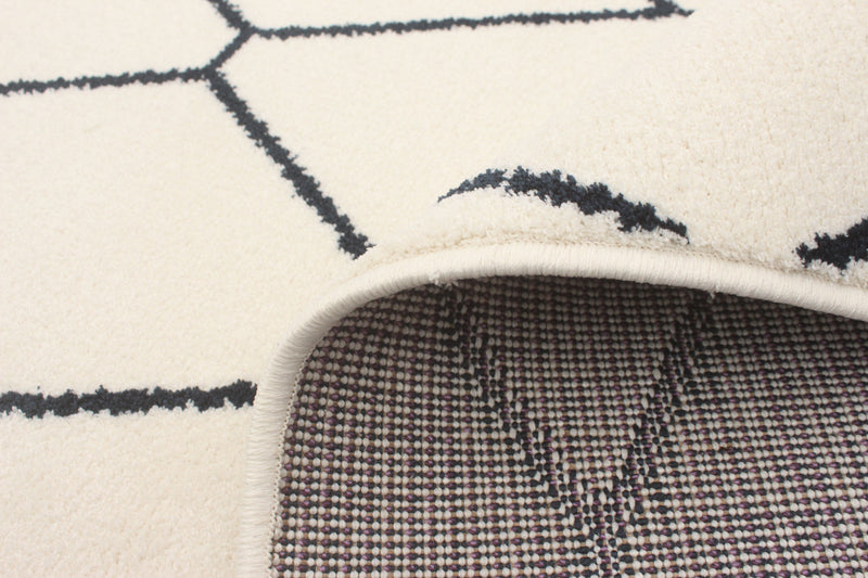 Carpette August blanchebleu marine 5 pi 3 po x 7 pi 3 po