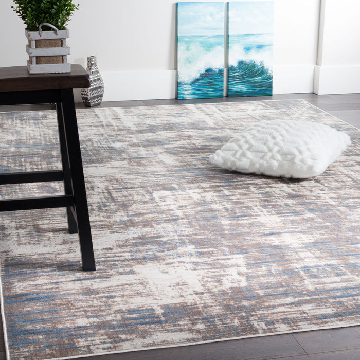 Carpette Shi bleue à motifs abstraits 5 x 8