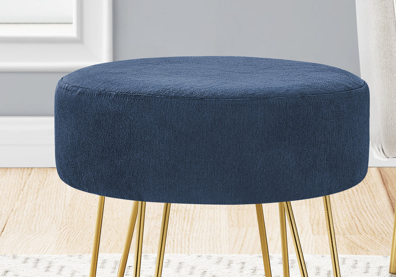 Pouf doré et tissu bleu