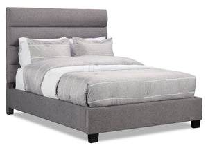 Lit rembourré Naya en tissu gris capitonné - format très grand lit