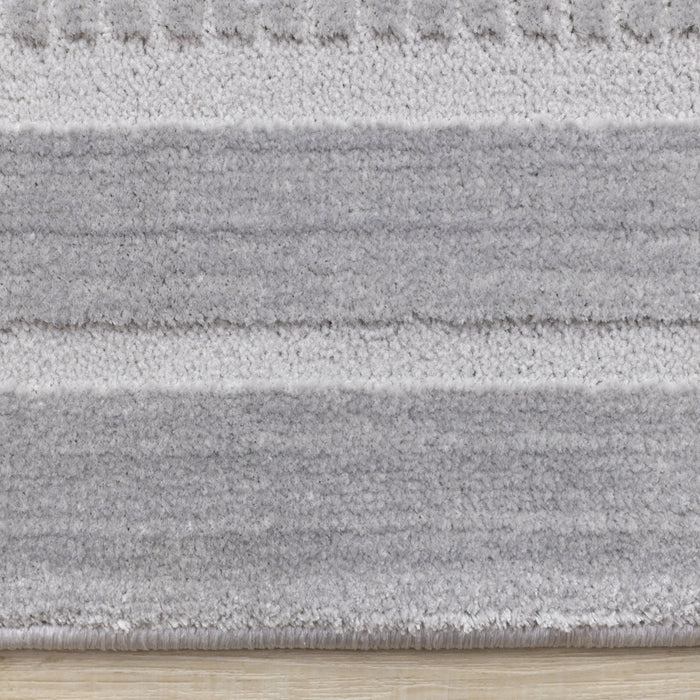 Carpette à poil long et court Ellie en polyester doux texturé à bordure grise - 7 pi 10 po x 10 pi 6 po