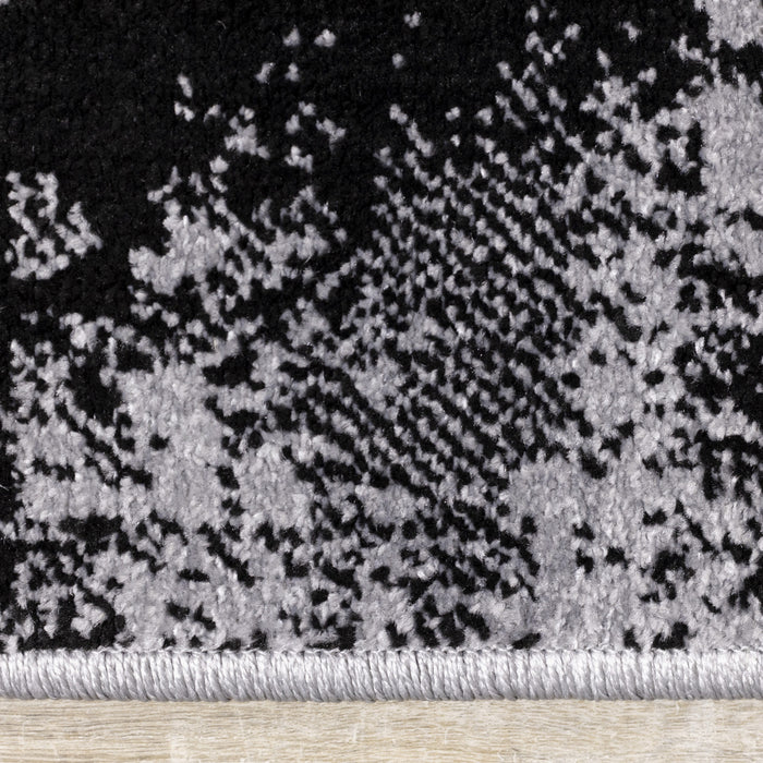 Carpette Covington à motifs de triangles vieillis - 2 pi 8 po x 4 pi 11 po