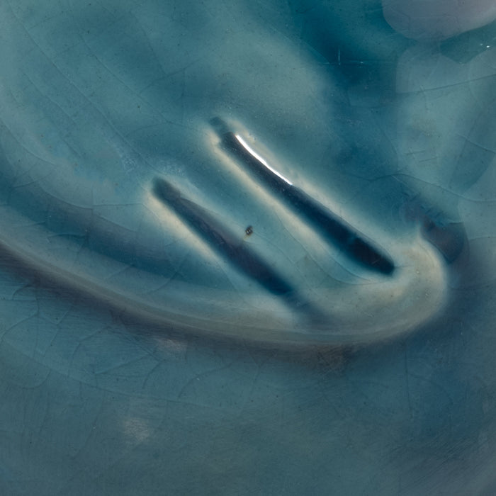 Oiseau qui regarde de côté de 5 po en céramique - bleu