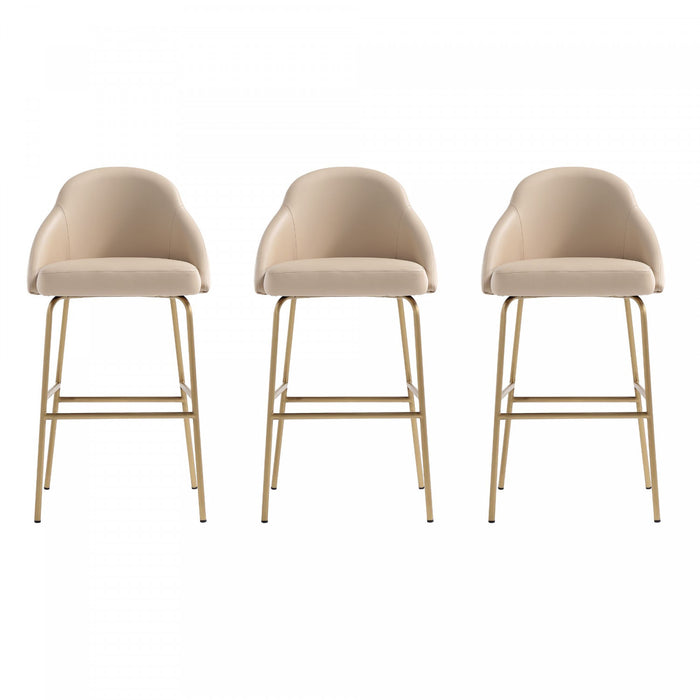 Tabouret de bar moderne en metal Gracie avec revetement en tissu, coloris beige et or - Lot de 3