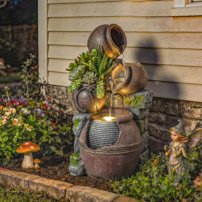 Fontaine exterieure Outsunny avec lumieres LED et cascade rocheuse
