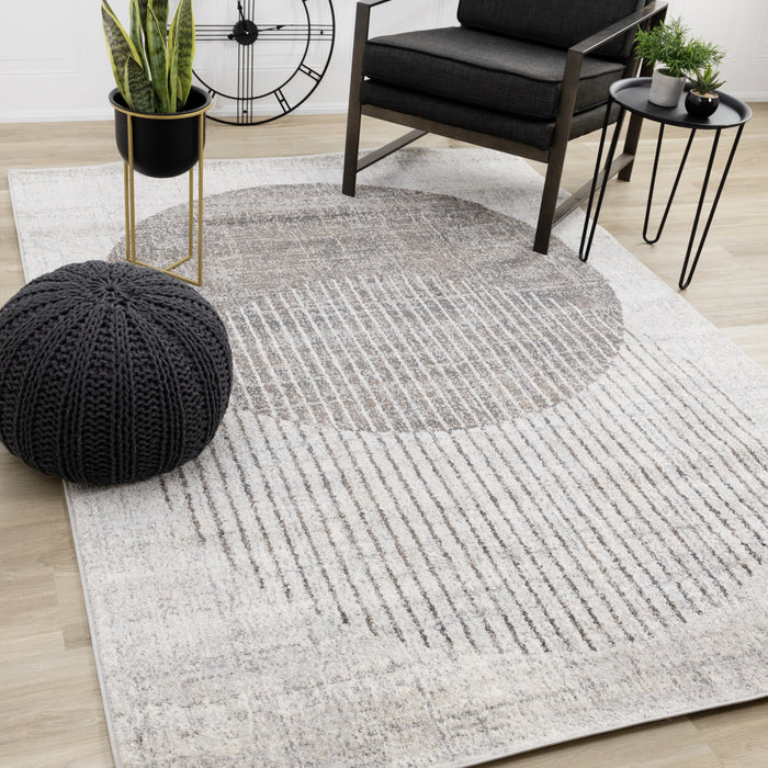 Carpette à poil court doux Solace grise et blanche à motif de cercles qui fusionnent - 5 pi 3 po x 7 pi 7 po