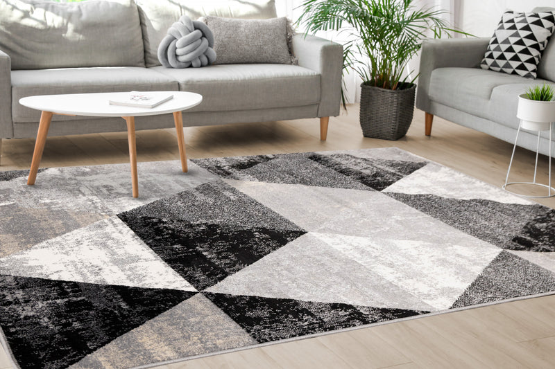 Carpette Covington à motifs de triangles vieillis - 2 pi 8 po x 4 pi 11 po