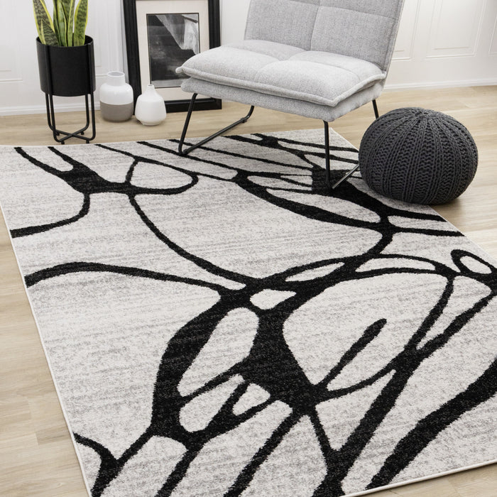 Tapis Emmett gris et noir avec motif tourbillon, 7'10\" x 10'6\"
