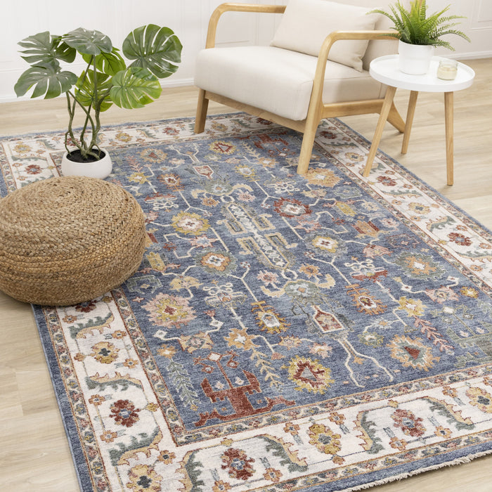 Tapis Olivia bleu a inspire tribal avec bordure, 7'10\" x 10'2\"