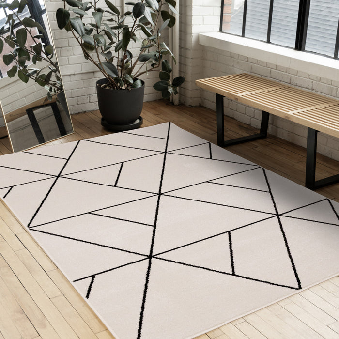 Tapis Covington a motif de treillis geometrique moderne blanc et noir, 5'3\" x 7'7\"