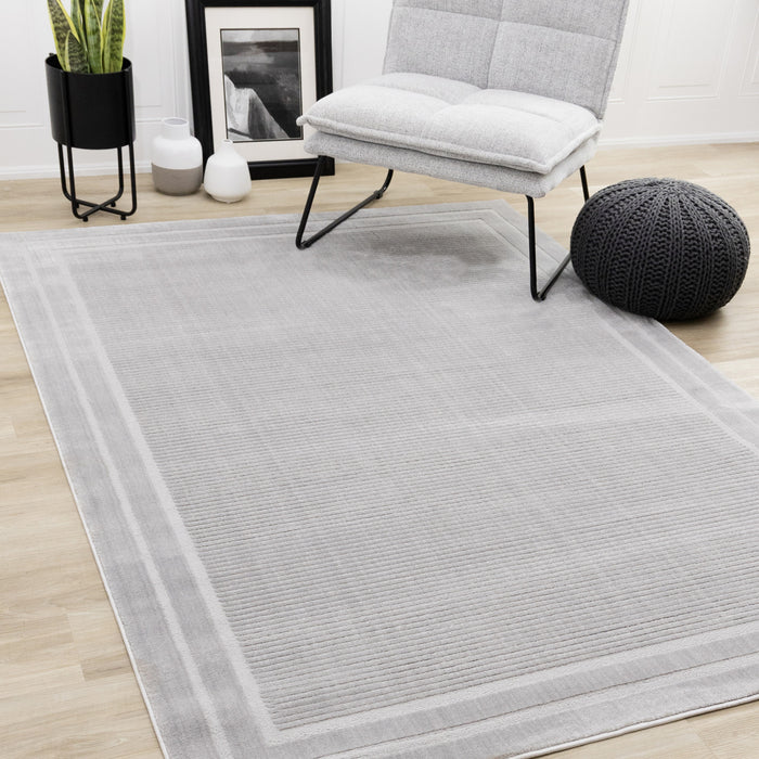 Carpette à poil long et court Ellie en polyester doux texturé à bordure grise - 7 pi 10 po x 10 pi 6 po
