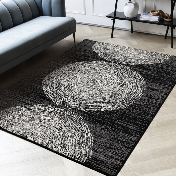 Tapis Florence noir, gris et blanc a motif d'anneaux d'arbre, 5'3\" x 7'4\"