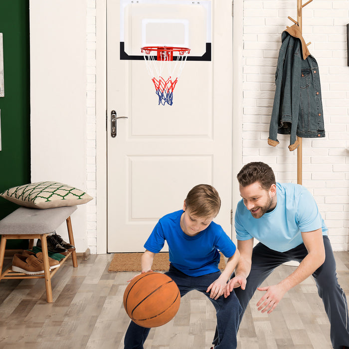 Le Mini-cerceau De Basket-ball Au-dessus De La Porte Comprend Le Basket-ball Et La Pompe A Main Sports D’interieur