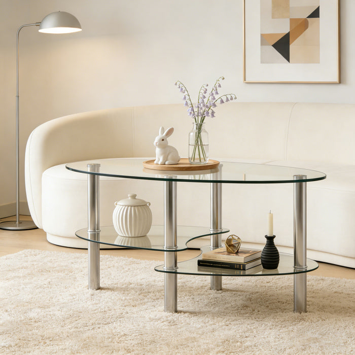 Table basse ovale transparente moderne Sophia en verre avec pieds en acier inoxydable, transparente