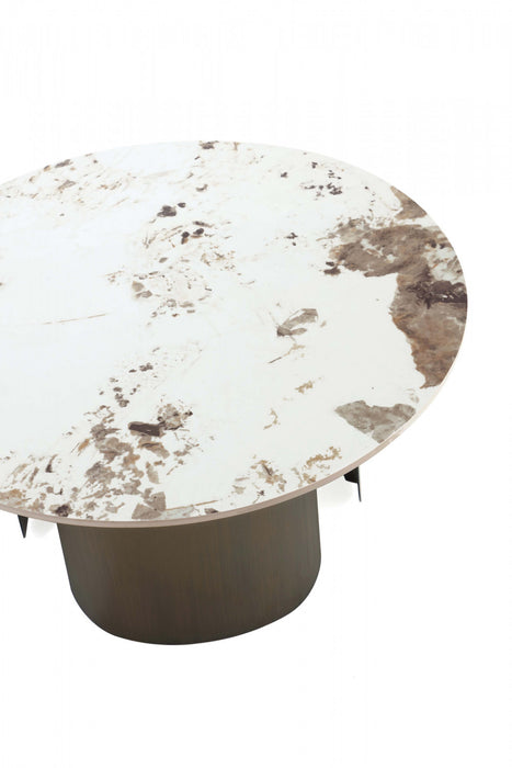 Table basse Monica Modern Glam avec plateau en pierre frittee, finition bronze