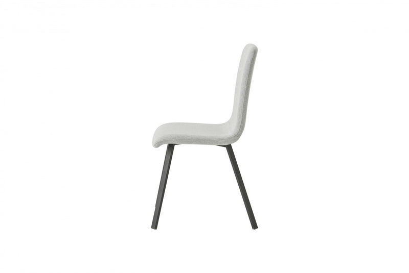Chaise de salle à manger avec revêtement en tissu gris clair et base en métal noir