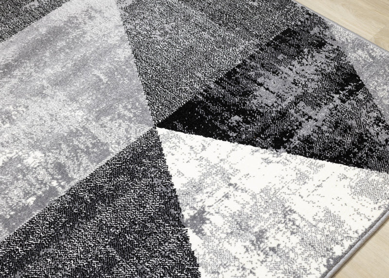 Tapis Covington triangle geometrique noir blanc gris vieilli, 5'3\" x 7'7\"