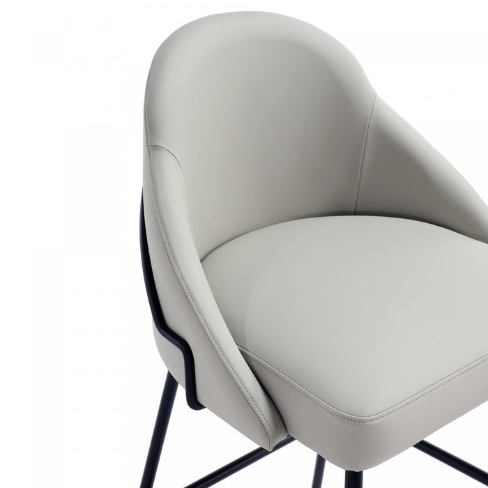 Tabouret de bar moderne en metal Gracie avec revetement en tissu, gris pierre et noir