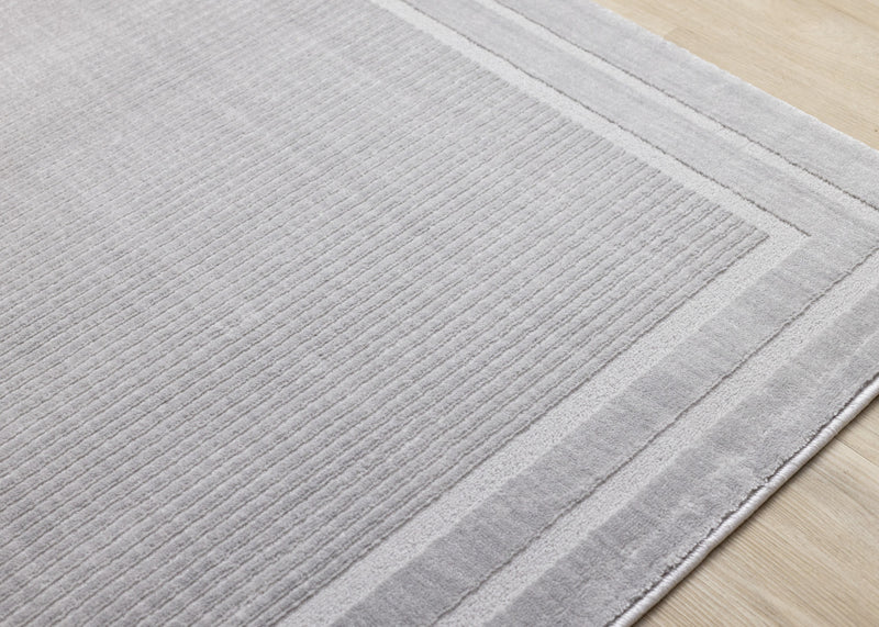 Carpette à poil long et court Ellie en polyester doux texturé à bordure grise - 7 pi 10 po x 10 pi 6 po