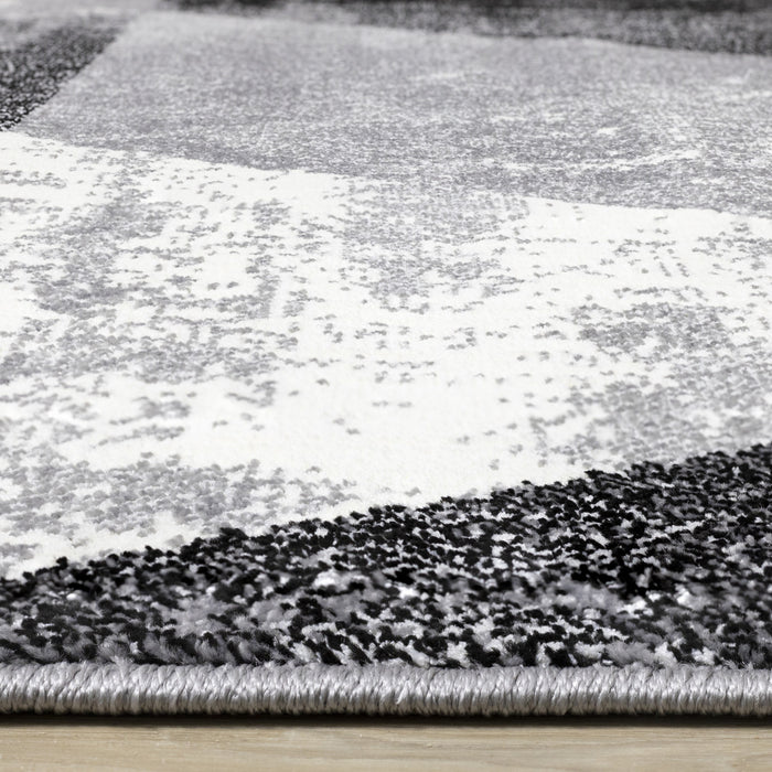 Tapis Covington triangle geometrique noir blanc gris vieilli, 5'3\" x 7'7\"