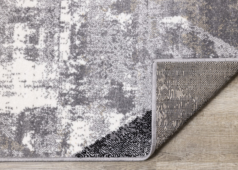 Carpette Covington à motifs de triangles vieillis - 2 pi 8 po x 4 pi 11 po