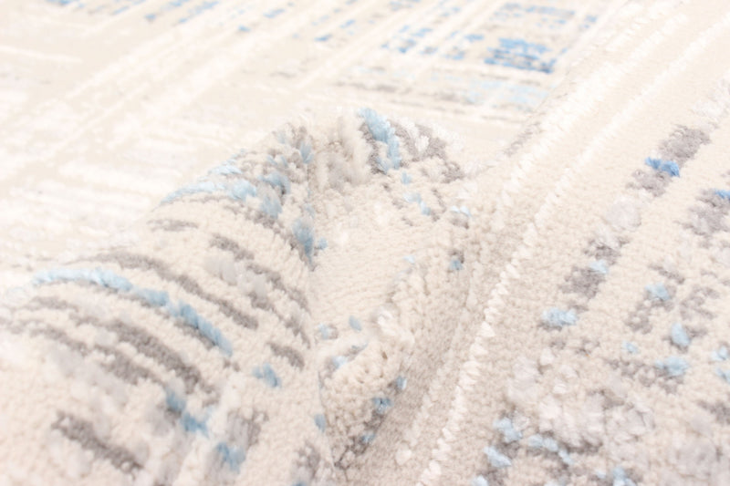 Tapis Contemporain/Moderne Quinn 5'0\" x 8'0\" en Bleu