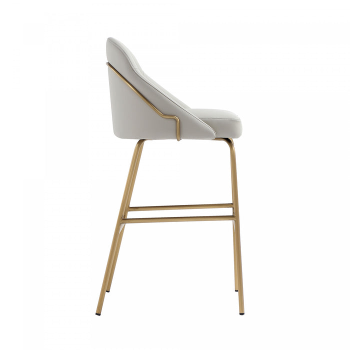 Tabouret de bar moderne en metal Gracie avec revetement en tissu, gris pierre et or - Lot de 3