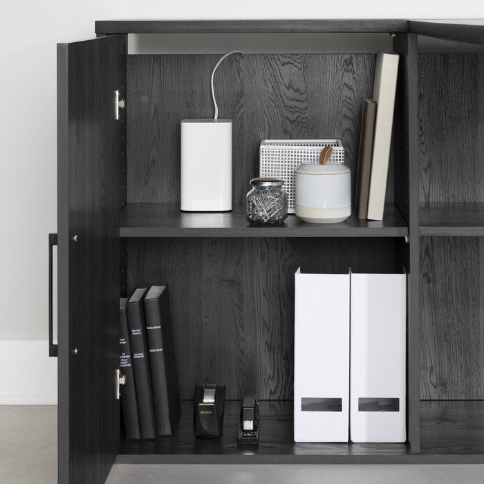 Bureau d’ordinateur en forme de L Zolten avec multiprise - chêne gris