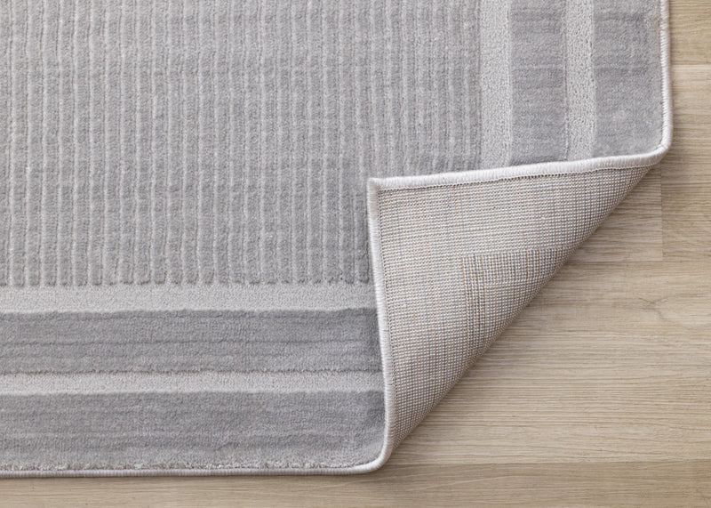 Carpette à poil long et court Ellie en polyester doux texturé à bordure grise - 7 pi 10 po x 10 pi 6 po