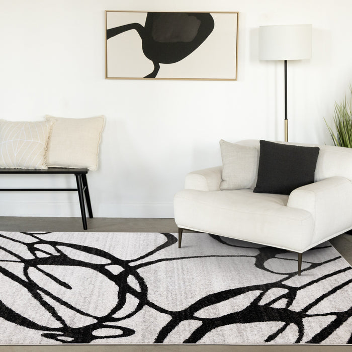 Tapis Emmett gris et noir avec motif tourbillon, 5'3\" x 7'7\"