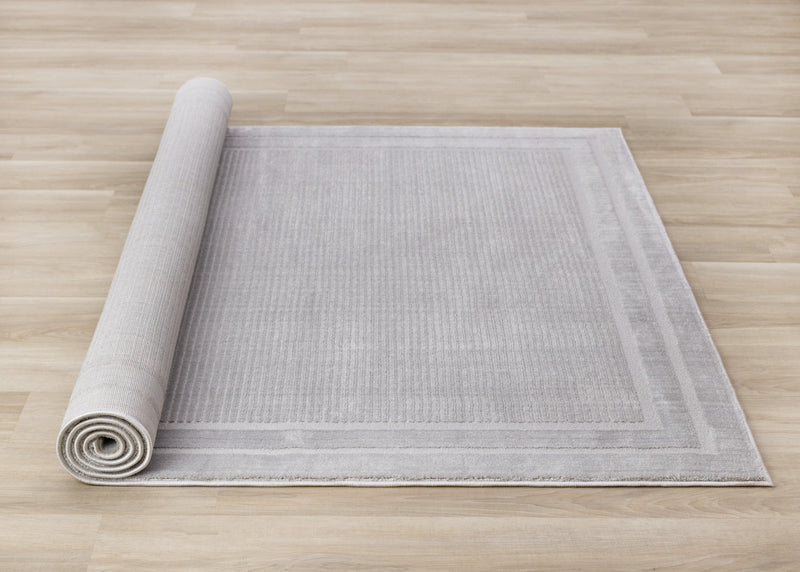 Carpette à poil long et court Ellie en polyester doux texturé à bordure grise - 7 pi 10 po x 10 pi 6 po