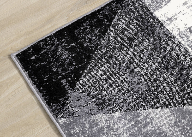 Tapis Covington triangle geometrique noir blanc gris vieilli, 5'3\" x 7'7\"