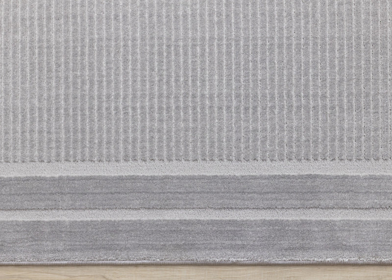 Carpette à poil long et court Ellie en polyester doux texturé à bordure grise - 5 pi 3 po x 7 pi 7 po