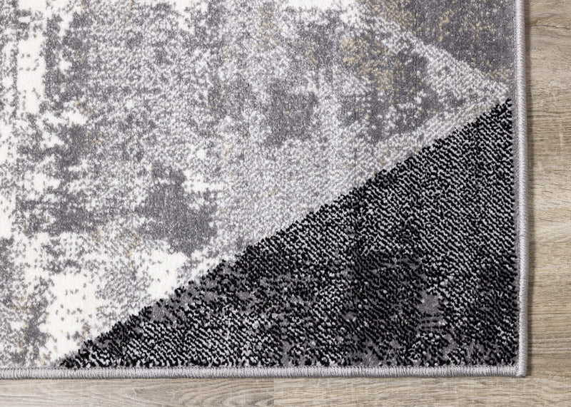 Carpette Covington à motifs de triangles vieillis - 5 pi 3 po x 7 pi 7 po