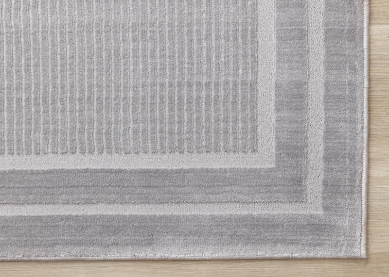 Carpette à poil long et court Ellie en polyester doux texturé à bordure grise - 5 pi 3 po x 7 pi 7 po