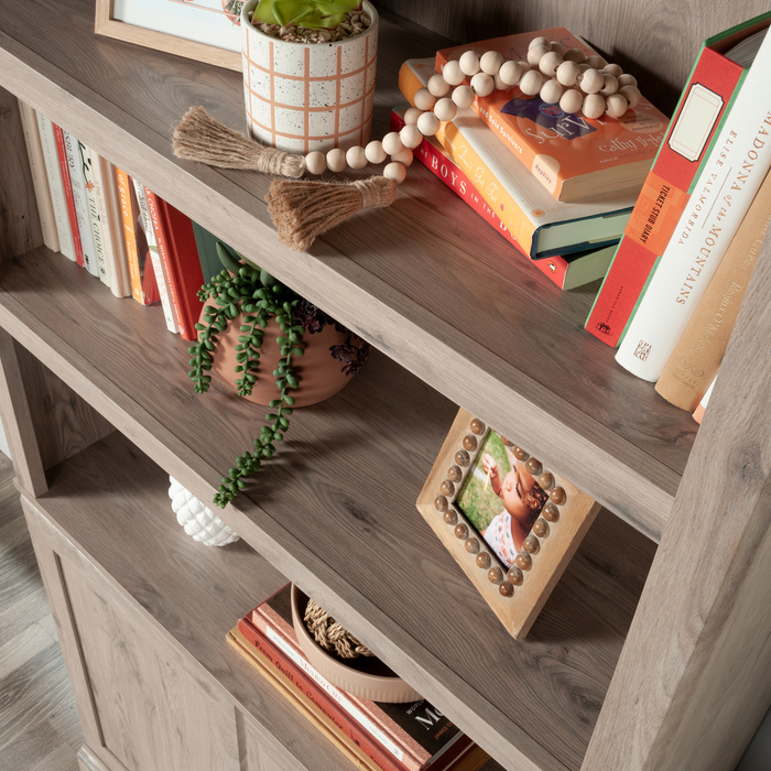 Bibliothèque Oryn de 35,28 po à 5 tablettes avec rangement - chêne Laurel