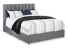 Lit de rangement Amos rembourré en tissu anthracite avec tête de lit à canaux et 3 tiroirs intégrés - format grand lit