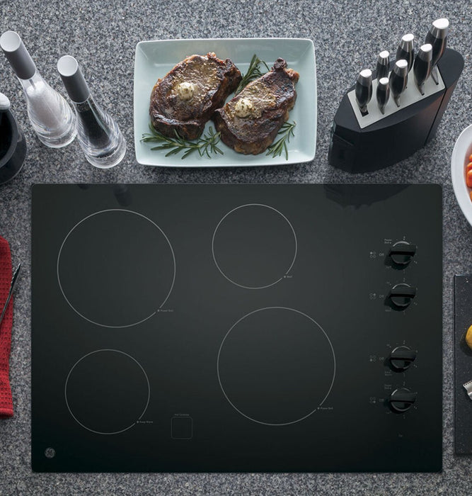 Surface de cuisson électrique GE de 30 po à 4 brûleurs - noire - JP3030DWBB