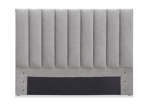 Tête de lit rembourrée Amos en tissu gris en canaux - format très grand lit