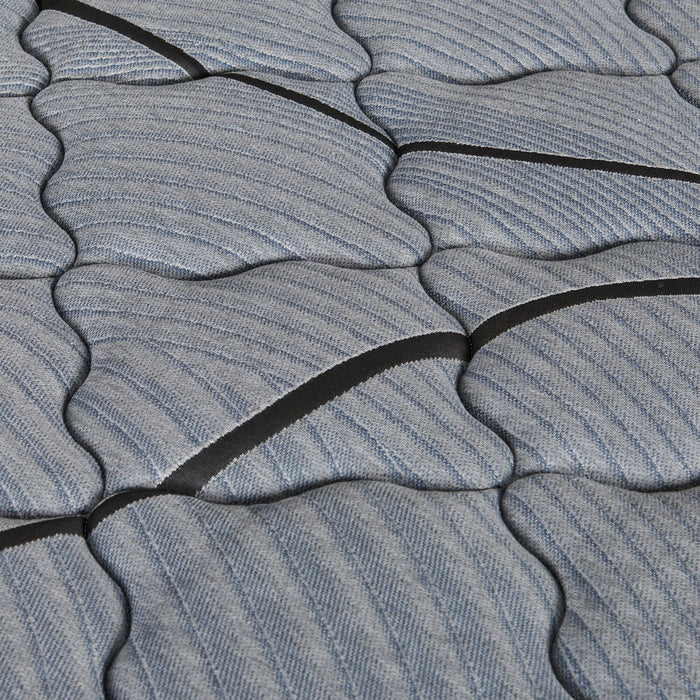 Matelas semi-ferme à plateau régulier dans une boîte Red Cedar de Springwall pour grand lit
