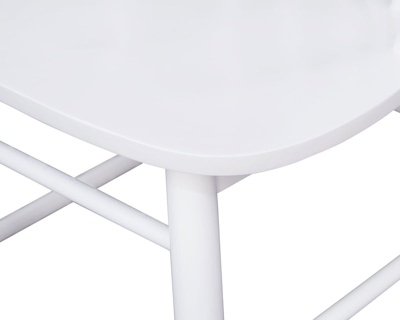 Chaise de salle à manger Remi avec dossier à barreaux en forme de fuseau courbé - blanche
