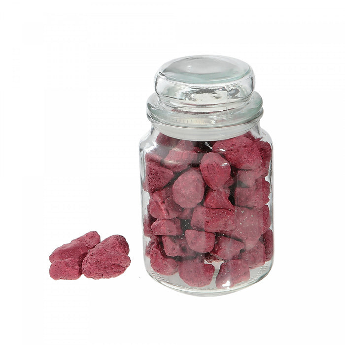 Pierres aromatiques à arôme de pot-pourri de baies dans un pot en verre avec couvercle