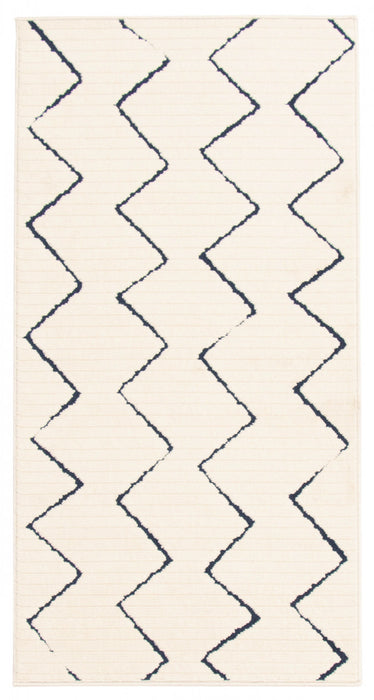 Carpette Kimi bleueivoire 2 pi 8 po x 4 pi 11 po
