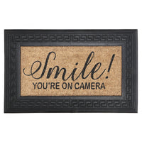 Tapis de plancher « Smile You’re on Camera » en caoutchouc et tapis-brosse